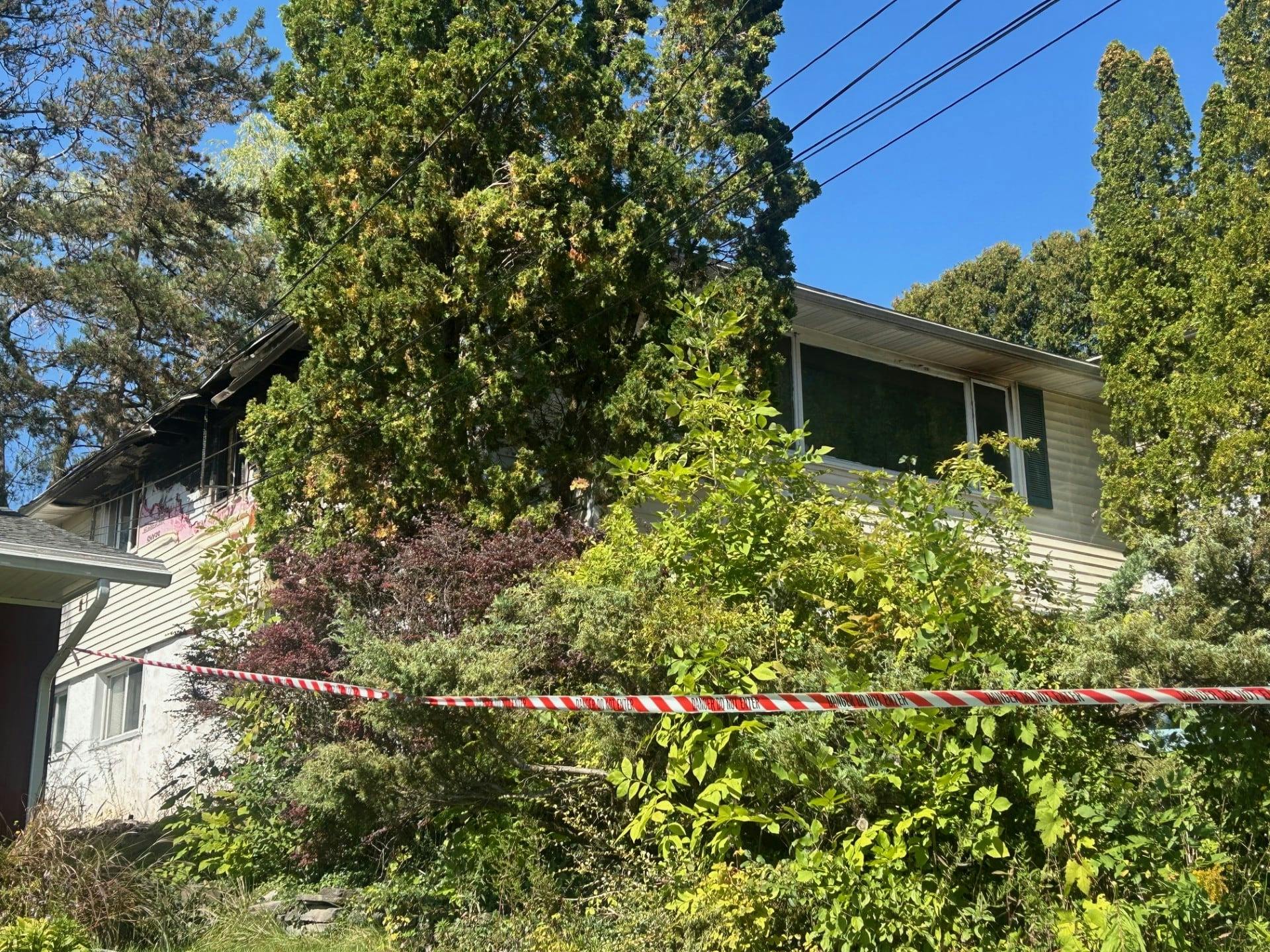 Syracuse, NY, firefighters saved an elderly woman from a house fire that started in the kitchen due to unattended cooking.
