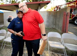 Kurt Krodle, brother of fallen Dallas firefighter Lt. Todd Krodle, receives a hug from Dallas Fire Rescue Chaplain Jackie Webb following a ceremony commemorating the Lt. Todd Krodle Firefighter Rescue Drill prop. Kurt Krodle, brother of fallen Dallas firefighter Lt. Todd Krodle, receives a hug from Dallas Fire Rescue Chaplain Jackie Webb following a ceremony commemorating the Lt. Todd Krodle Firefighter Rescue Drill prop.