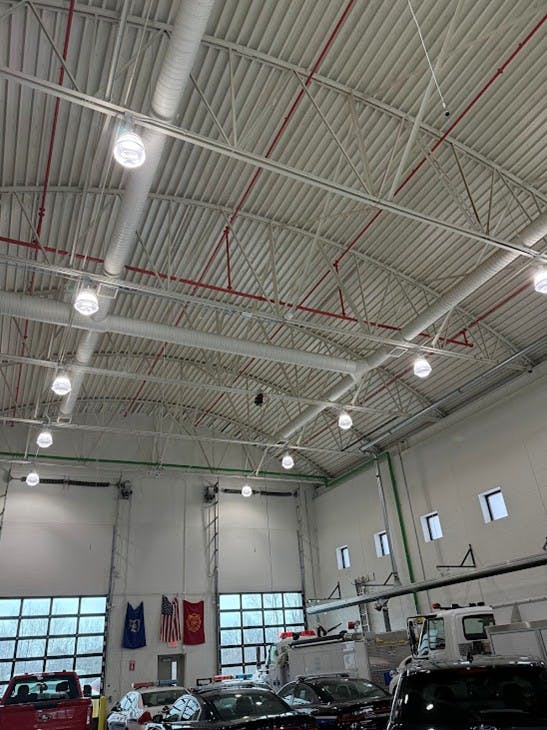 A flat commercial roof might hide a bowstring truss (shown here) or lightweight steel bar joists, both of which are prone to early failure.