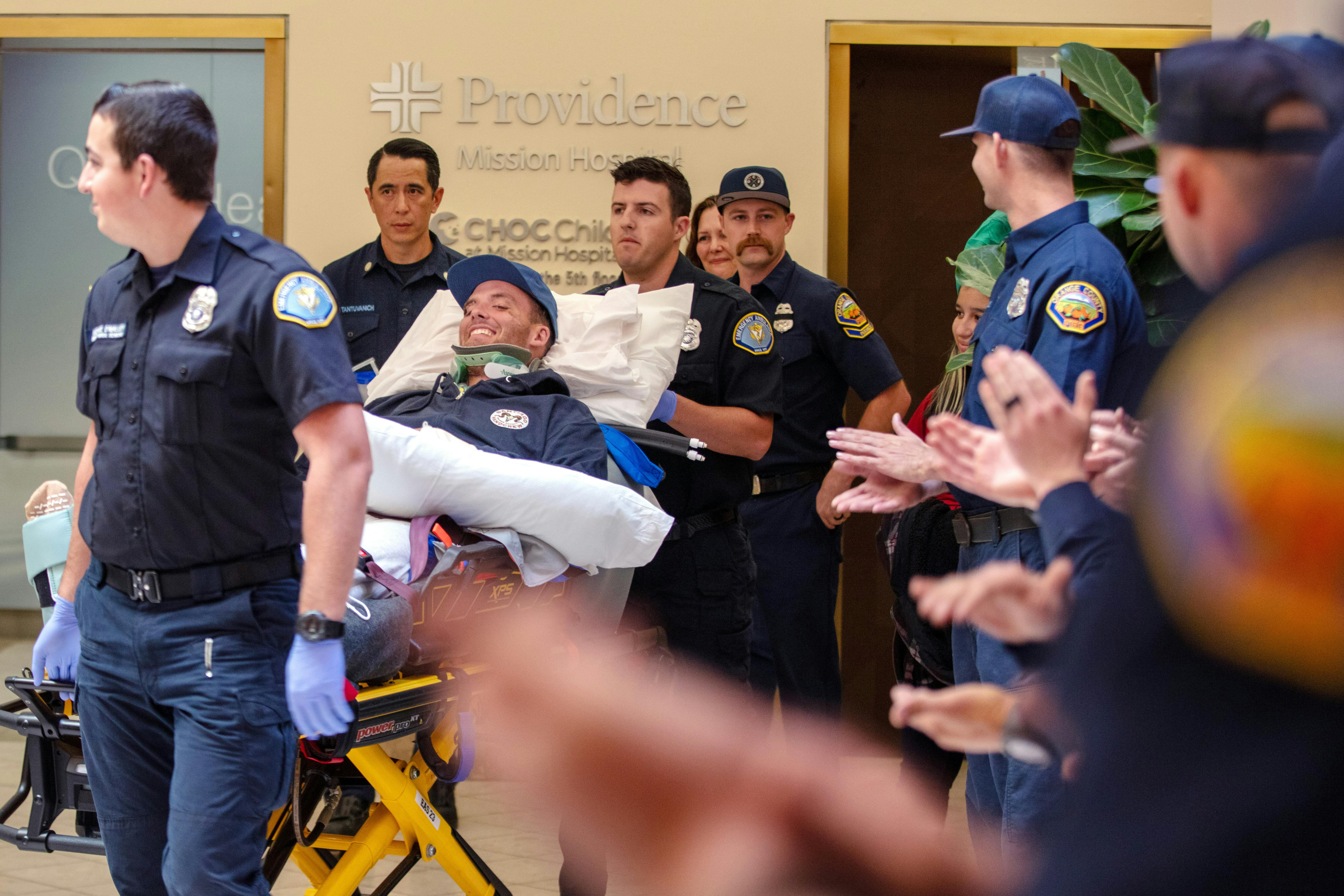 In this file photo from October 2024, Orange County Fire Authority hand crew member Andrew Brown was moved from a hospital to Craig Hospital in Englewood, CO, for treatment. A year later, he is still working toward a return to work.