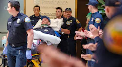 In this file photo from October 2024, Orange County Fire Authority hand crew member Andrew Brown was moved from a hospital to Craig Hospital in Englewood, CO, for treatment. A year later, he is still working toward a return to work.