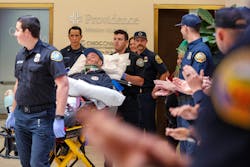 In this file photo from October 2024, Orange County Fire Authority hand crew member Andrew Brown was moved from a hospital to Craig Hospital in Englewood, CO, for treatment. A year later, he is still working toward a return to work. In this file photo from October 2024, Orange County Fire Authority hand crew member Andrew Brown was moved from a hospital to Craig Hospital in Englewood, CO, for treatment. A year later, he is still working toward a return to work.