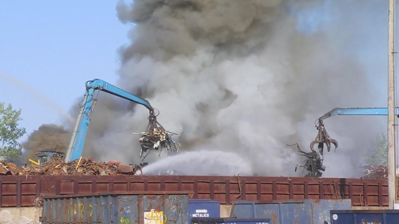 Crews battle large scrap metal yard fire for several hours in DeWitt
