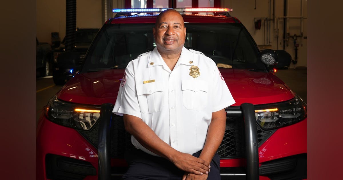 Minneapolis Fire Chief Hanging up Gear Firehouse Minneapolis Fire Chief Hanging up Gear Firehouse
