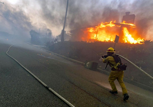 A firefighter works at the Palisades fire in January.