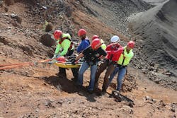 Members of the Meadows Valley Fire Department, Grangeville Mountain Rescue Unit, Riggins Ambulance and Valley County Search and Rescue practice carrying a stokes basket down the side of a rock face. The training was part of the annual Introduction to Rope Rescue training event held in New Meadows. Members of the Meadows Valley Fire Department, Grangeville Mountain Rescue Unit, Riggins Ambulance and Valley County Search and Rescue practice carrying a stokes basket down the side of a rock face. The training was part of the annual Introduction to Rope Rescue training event held in New Meadows.