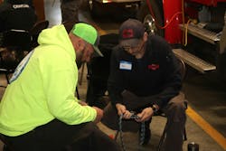 John Finley (left) of the Grangeville Mountain Rescue Unit helps Steve Babb (right) of the Weiser Fire Department tie a rescue knot. John Finley (left) of the Grangeville Mountain Rescue Unit helps Steve Babb (right) of the Weiser Fire Department tie a rescue knot.