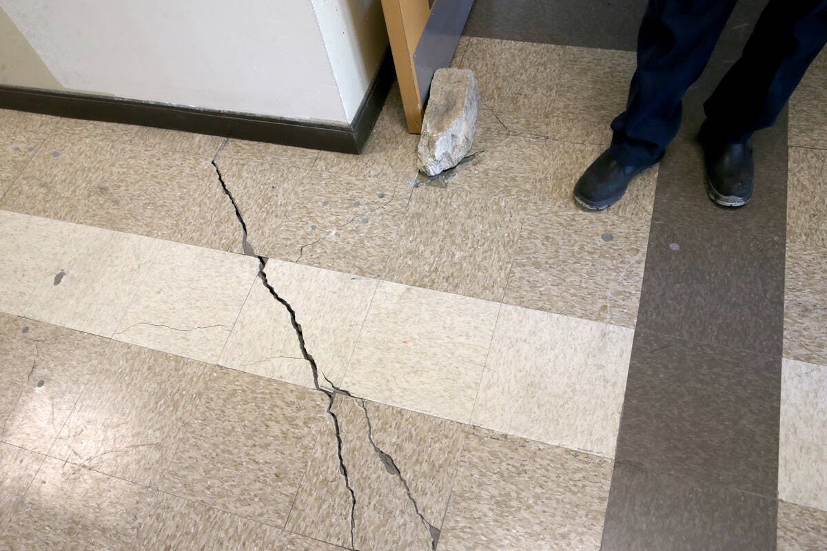 A probe after cracks appeared showed the station was sinking.