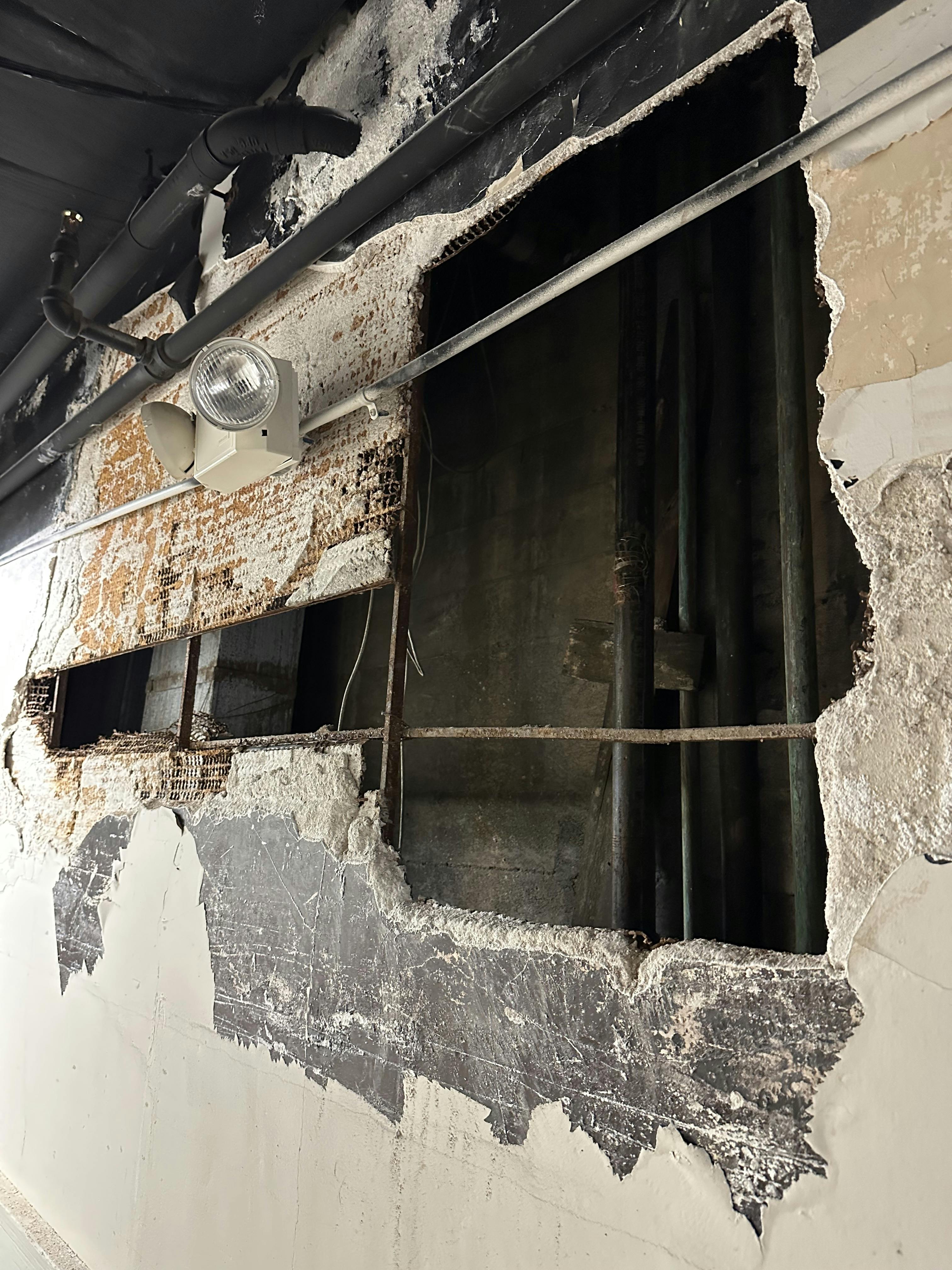 Vacant mid-rise and high-rise buildings must be examined regularly for changes that occurred. Open or removed fire doors, damaged or missing walls, holes in the floors, removed or weakened stairs, open shafts and exposed plenum spaces allow for significant smoke and fire spread and can cause falls, disorientation emergencies or entanglements.