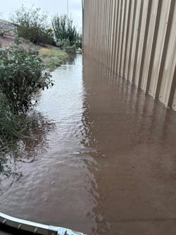 Water pooled up along the east wall of the Hall of Flame in Phoenix. They are working to remove dirt from the area to level the ground in that area. Water pooled up along the east wall of the Hall of Flame in Phoenix. They are working to remove dirt from the area to level the ground in that area.