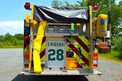 Engine 28’s hosebed and rear body provide for low access to the hard-suction hose and 5-inch rear intake. The beavertail panels provide support for the rear step to accommodate the Humat valve. Note the full-length, stainless-steel handrails that are on each side of the body. Engine 28’s hosebed and rear body provide for low access to the hard-suction hose and 5-inch rear intake. The beavertail panels provide support for the rear step to accommodate the Humat valve. Note the full-length, stainless-steel handrails that are on each side of the body.
