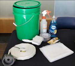 Contents of a decontamination bucket: clear trash bags, duct tape, liquid dish soap, a short-handle scrub brush, an all-purpose spray bottle, baby wipes, two 50-foot ¾-inch hoselines, two garden hose spray nozzles, a 2½-inch female X adapter, a ¾-inch male GHT adapter and a collapsible traffic cone (not pictured). Contents of a decontamination bucket: clear trash bags, duct tape, liquid dish soap, a short-handle scrub brush, an all-purpose spray bottle, baby wipes, two 50-foot ¾-inch hoselines, two garden hose spray nozzles, a 2½-inch female X adapter, a ¾-inch male GHT adapter and a collapsible traffic cone (not pictured).