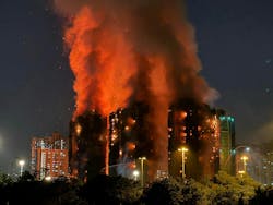 Thick smoke and flames rise as a major fire engulfs several apartment blocks at the Wang Fuk Court residential estate in Hong Kong's Tai Po district on Nov. 26, 2025. At least 36 people were killed when a fire engulfed several high-rise blocks in a Hong Kong residential estate on Nov. 26, the government said, with media reporting that some residents were trapped inside. (Yan Zhao/AFP via Getty Images/TNS) Thick smoke and flames rise as a major fire engulfs several apartment blocks at the Wang Fuk Court residential estate in Hong Kong's Tai Po district on Nov. 26, 2025. At least 36 people were killed when a fire engulfed several high-rise blocks in a Hong Kong residential estate on Nov. 26, the government said, with media reporting that some residents were trapped inside. (Yan Zhao/AFP via Getty Images/TNS)