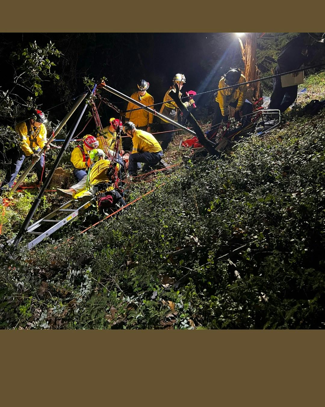 Rescue technicans set up operations to rescue a person who fell into an abandoned mine.