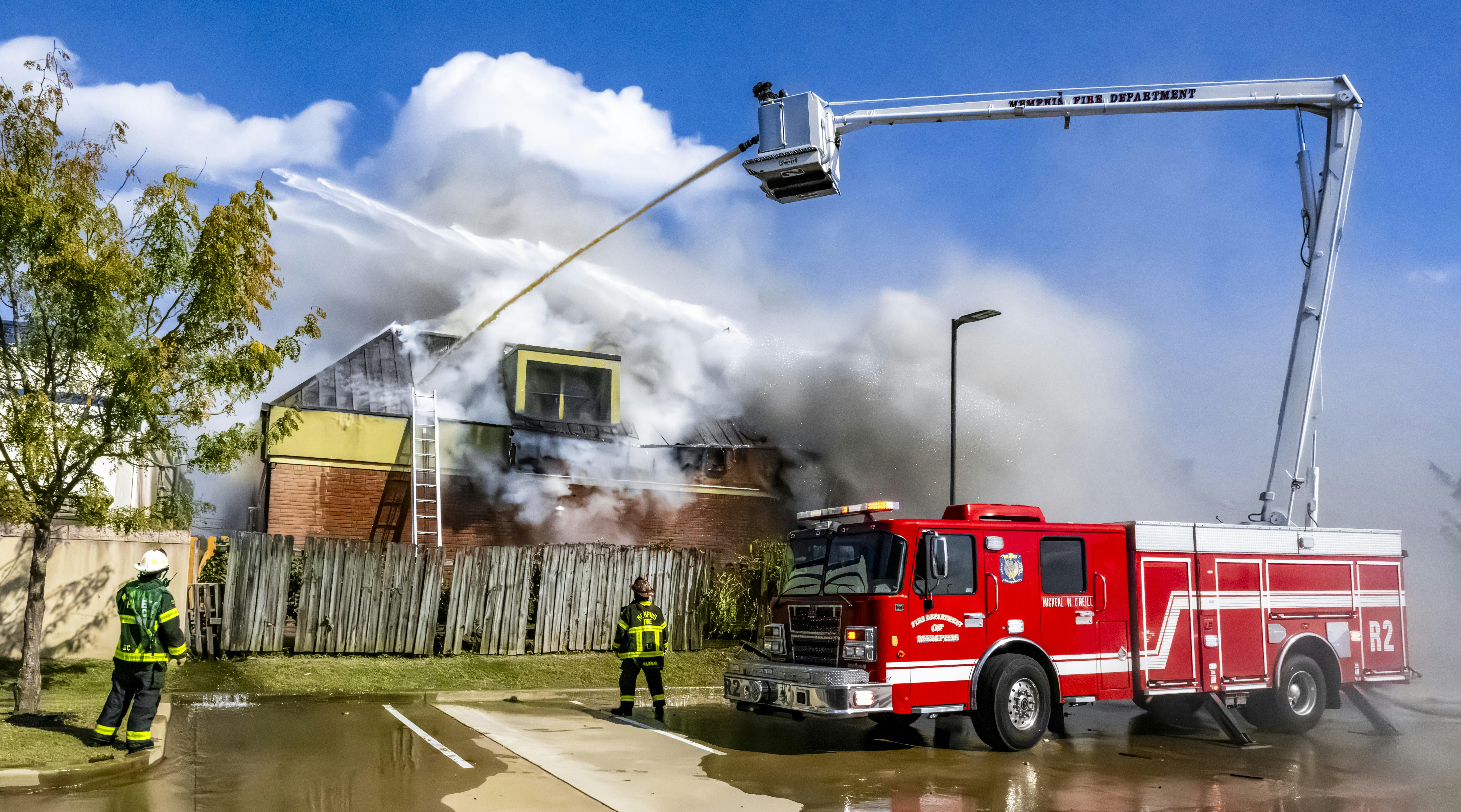 firefighters commercial building fire hair salon Memphis Tennessee Fire Department