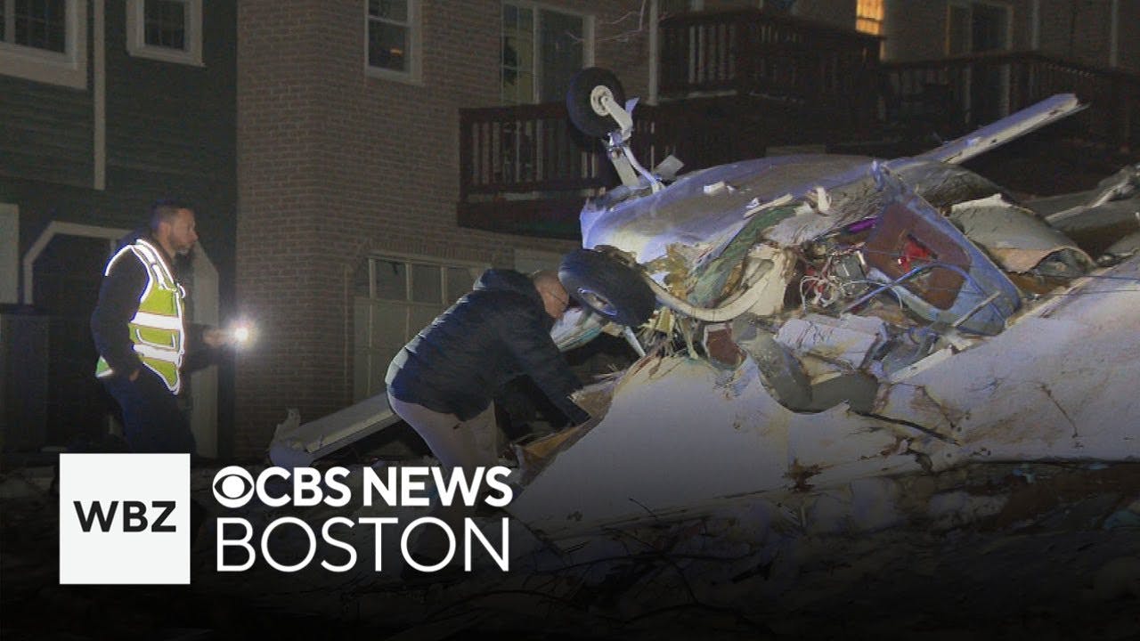 Plane crashes into New Hampshire building, pilot rescued