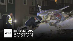 Plane crashes into New Hampshire building, pilot rescued