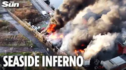 Massive fire erupts at UK harbour as several lorries go up in flames
