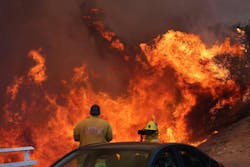 Firefighters were surrounded by raging flames in Palisades on Jan. 7, 2025. Firefighters were surrounded by raging flames in Palisades on Jan. 7, 2025.