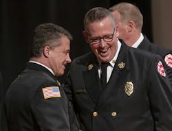 St. Paul Fire Chief Butch Inks, right, shares a laugh with Assistant Chief Anthony Farina before the start of the St. Paul Fire Academy Class of 2025-B graduation ceremony last month. St. Paul Fire Chief Butch Inks, right, shares a laugh with Assistant Chief Anthony Farina before the start of the St. Paul Fire Academy Class of 2025-B graduation ceremony last month.