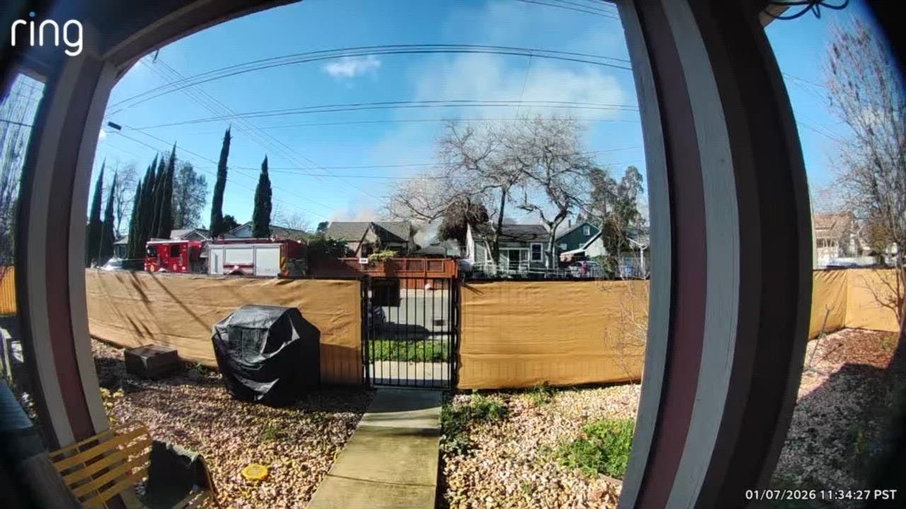 Surveillance footage shows fire and smoke at Sacramento home in Oak Park