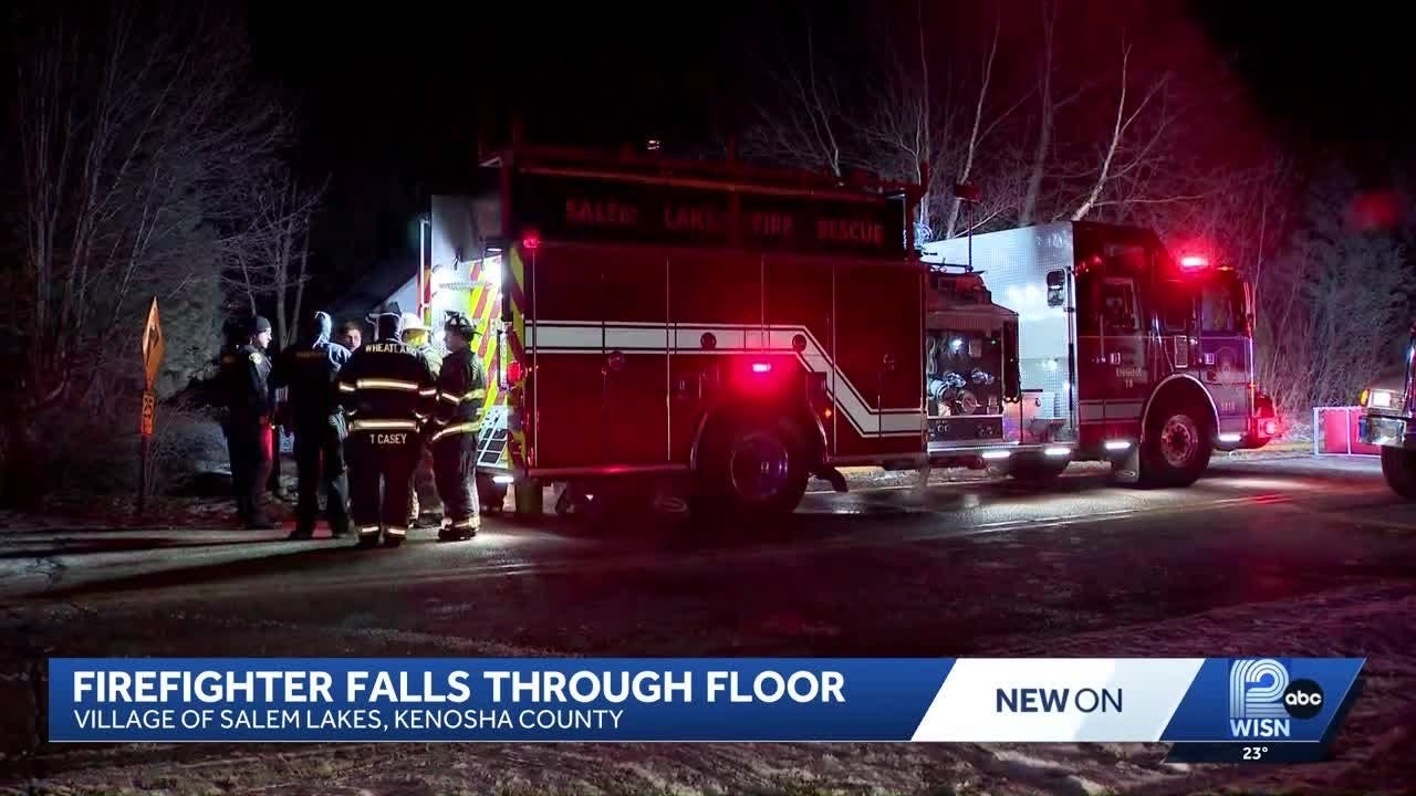 Firefighter falls through floor at house fire