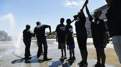 Denver firefighters hosted teens at the training center to introduce them to the fire service. Denver firefighters hosted teens at the training center to introduce them to the fire service.