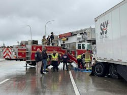 Louisville Firefighters Rescue Driver from Spaghetti Junction Bridge Louisville Firefighters Rescue Driver from Spaghetti Junction Bridge