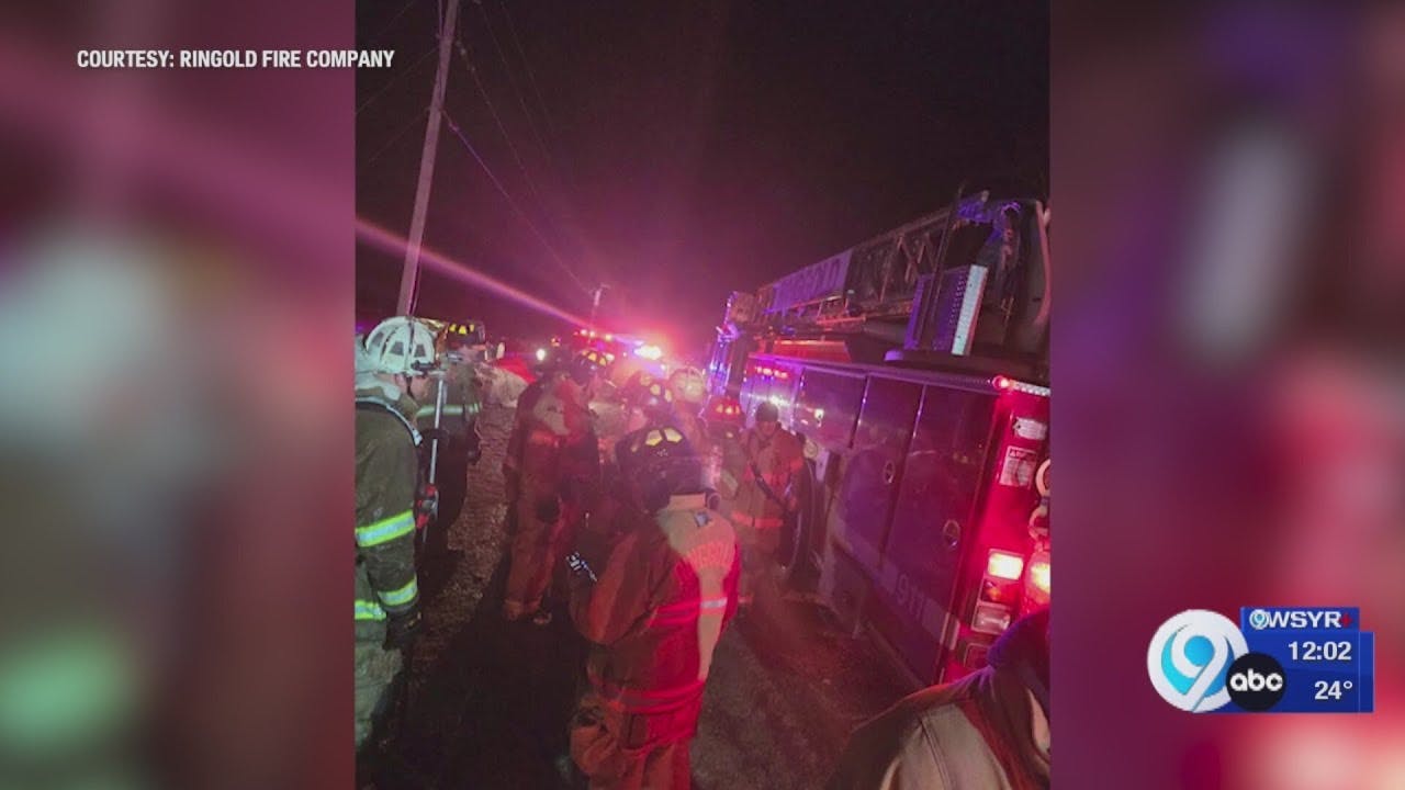 Pulaski couple rescued after husband runs back into burning home for his wife,