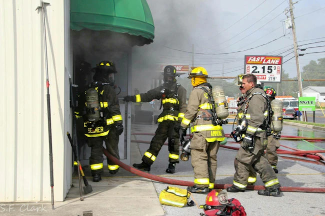 At this mattress warehouse fire, the incident safety officer, who is in full gear, is confirming accountability beyond the tags, including confirming who entered the immediately dangerous to life and health environment and those individuals&rsquo; time in for rules of air management (ROAM). This visual confirmation and face-to-face with the entry point officer is critical. If you look closely, you also can see a chief officer who is the rapid intervention team (RIT) chief. Span of control is critical when going offensive for a commercial building fire.