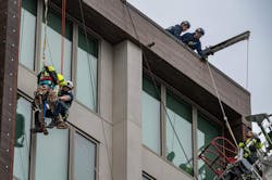 Two workers were rescued by Sacramento firefighters. Two workers were rescued by Sacramento firefighters.