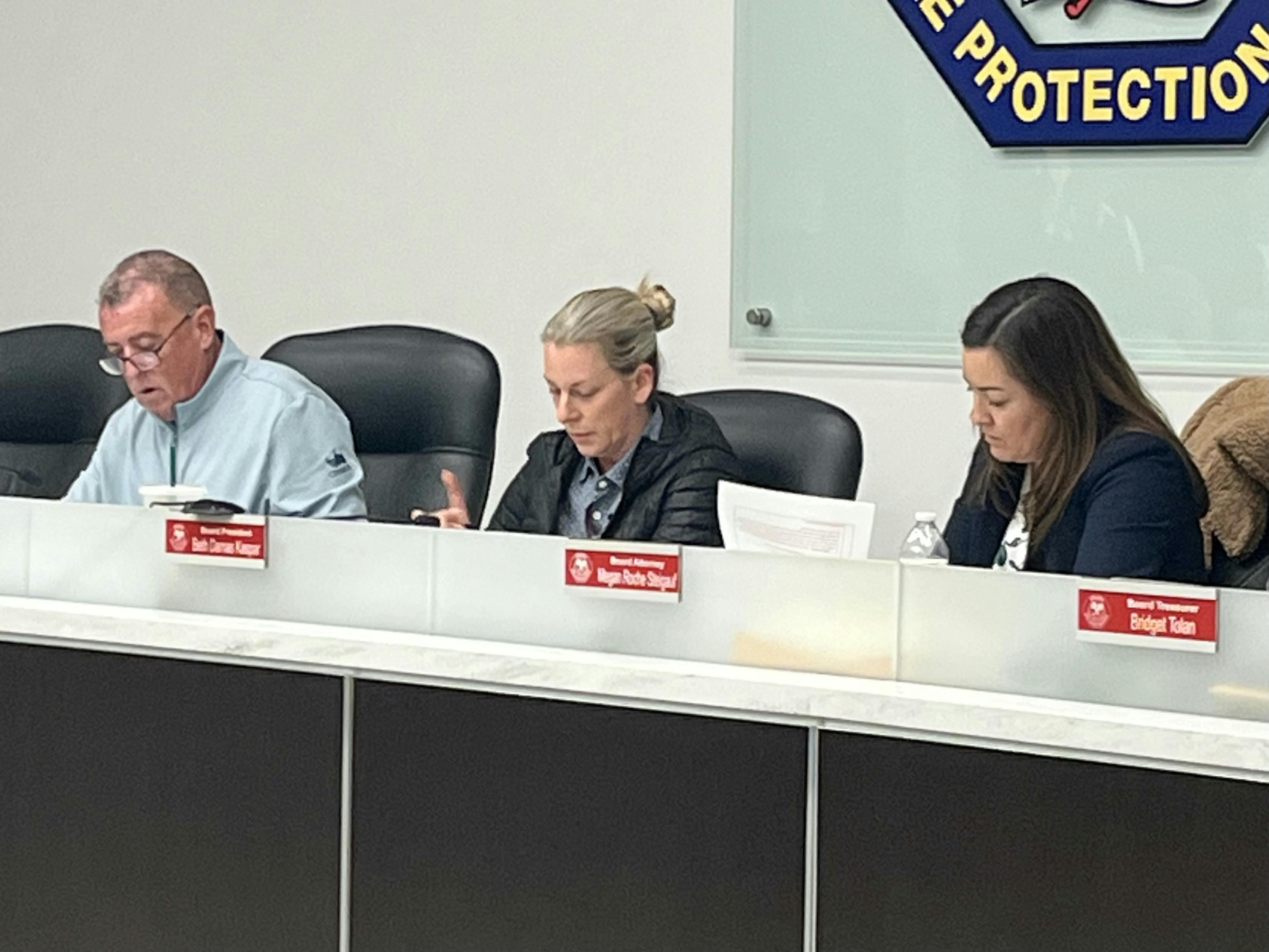 Orland Fire Protection District board President Beth Damas Kasper, middle, speaks during a meeting on Feb. 24.
