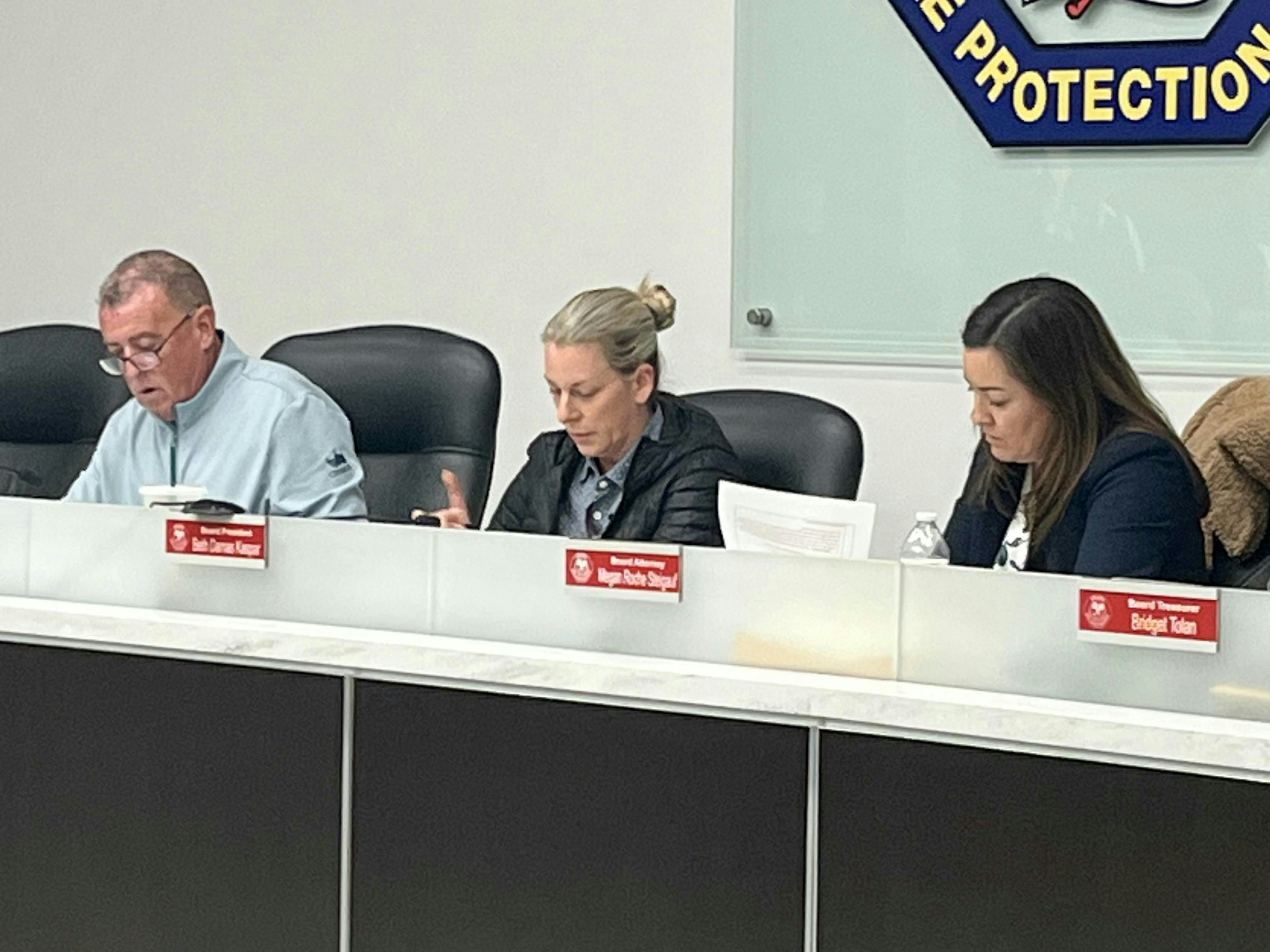 Orland Fire Protection District board President Beth Damas Kasper, middle, speaks during a meeting on Feb. 24.