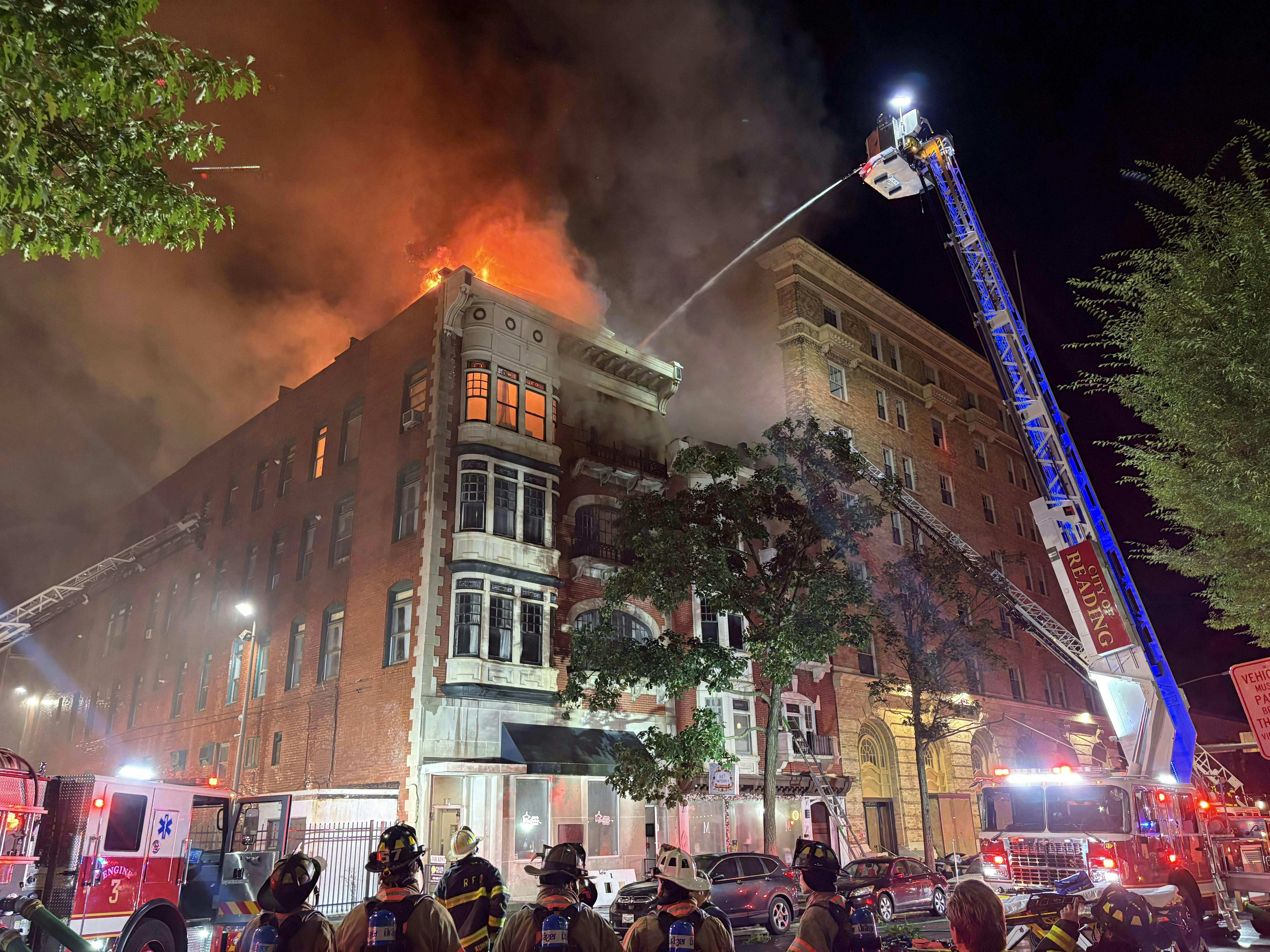 firefighter apartment building fire victim rescue Reading Pennsylvania Fire Department