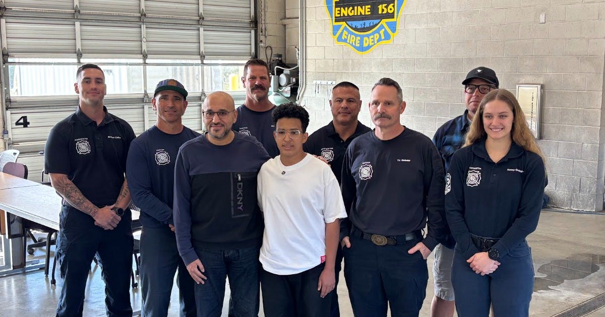 Just seven months after Zeyad Elsuhimi, center, cheated death after he was hit by a truck on his way to school, he stopped by a firehouse to thank Glendale medics and firefighters.