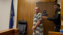Former Saginaw County Firefighter Ryan M. Schilling walks into the courtroom.