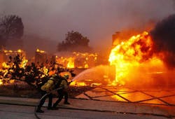 Firefighters battle the Palisades fire on El Medio Ave. on Tuesday, Jan. 7, 2025. California. Firefighters battle the Palisades fire on El Medio Ave. on Tuesday, Jan. 7, 2025. California.