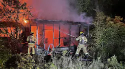 The Burton Fire District battles a fire in an abandoned structure without power where homeless people were reported to have been staying. The Burton Fire District battles a fire in an abandoned structure without power where homeless people were reported to have been staying.