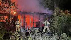 The Burton Fire District battles a fire in an abandoned structure without power where homeless people were reported to have been staying. The Burton Fire District battles a fire in an abandoned structure without power where homeless people were reported to have been staying.