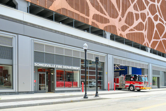 The Somerville, MA, Fire Department&rsquo;s Assembly Fire Station is integrated into the city&rsquo;s Xmbly parking garage/retail space property. Focused attention on fine-tuning the developer&rsquo;s original proposal, meeting Risk Category IV requirements, and smart placement of spaces that are provided with daylighting were among key architectural and construction parameters.