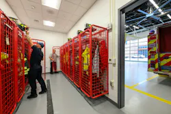 The firehouse’s turnout gear and decontamination rooms originally were conceived to be at the side of the apparatus bay. They were moved to the rear of the bay after it was determined that the bay needed to be 48 feet deep to fit the apparatus. The firehouse’s turnout gear and decontamination rooms originally were conceived to be at the side of the apparatus bay. They were moved to the rear of the bay after it was determined that the bay needed to be 48 feet deep to fit the apparatus.