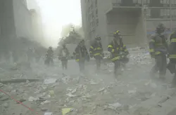 Firefighters search the debris at the World Trade Center after the terrorists' attack. Firefighters search the debris at the World Trade Center after the terrorists' attack.