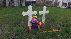 Crosses and the chief's favorite footwear mark the scene where the final alarm ended for the two Walnuttown fire officers. Crosses and the chief's favorite footwear mark the scene where the final alarm ended for the two Walnuttown fire officers.