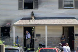 Overland Park firefighters at the scene on an early-morning apartment fire where firefighters rescued several residents Saturday. Overland Park firefighters at the scene on an early-morning apartment fire where firefighters rescued several residents Saturday.