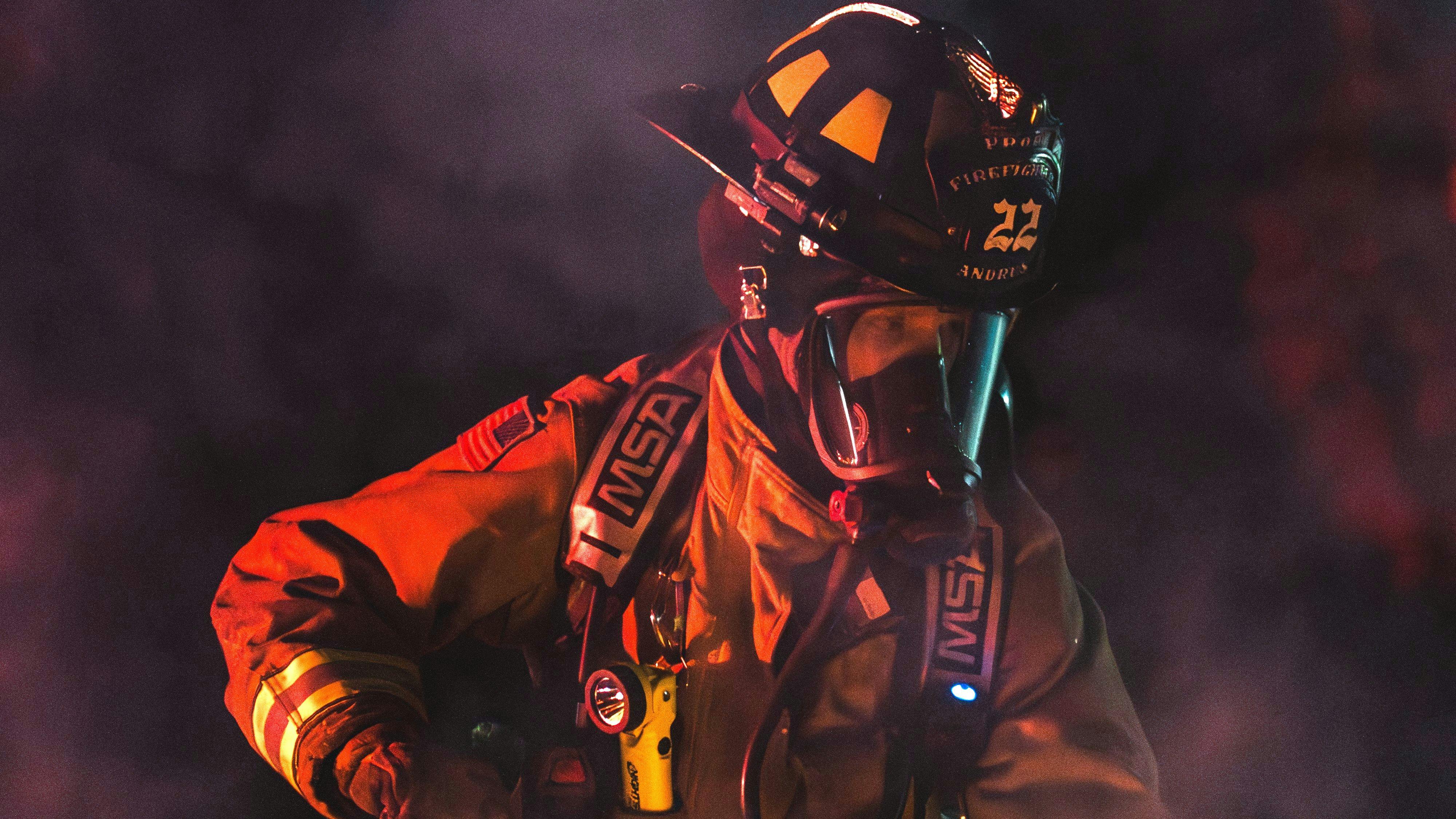 firefighter in SCBA mask on the fire ground