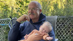 retired fire chief spending time with his grandchild as part of his vision for life after retirement