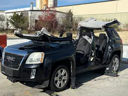 crashed SUV that has its roof peeled back as effort to rescue victims crashed SUV that has its roof peeled back as effort to rescue victims