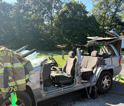 crashed SUV that has its roof peeled back as effort to rescue victims crashed SUV that has its roof peeled back as effort to rescue victims