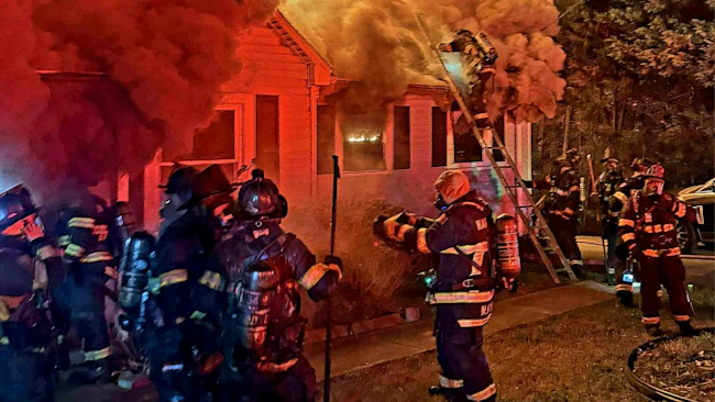firefighters on scene of a house fire