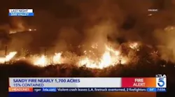 Tens of thousands still evacuated as crews continue battling Sandy Fire